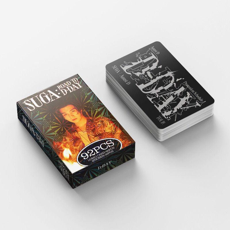 PHOTOCARTES SUGA : ROAD TO D'DAY 92 PCS (60 PHOTOCARTES + 32 STICKERS)