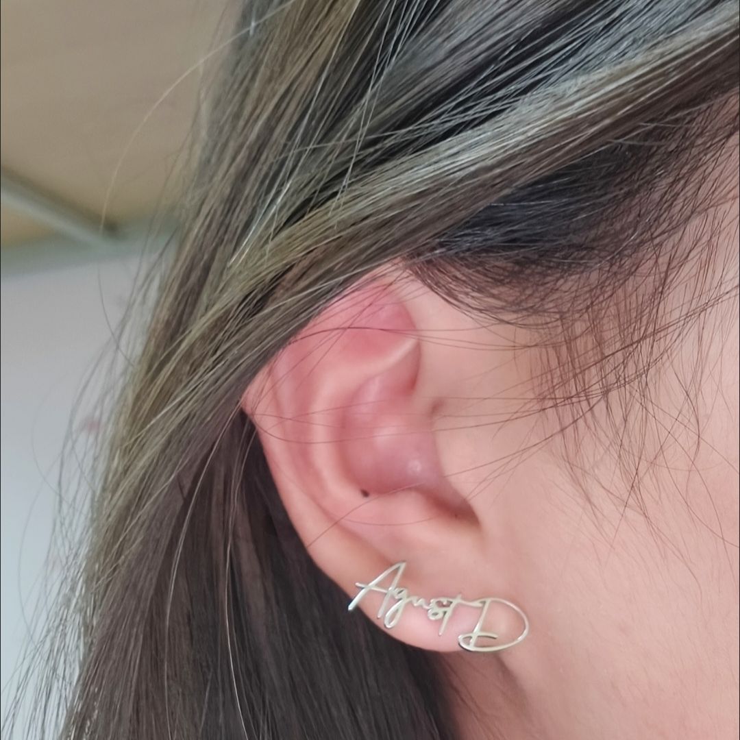 PAIRE DE BOUCLES D'OREILLES SUGA AGUST D EN ACIER INOXYDABLE