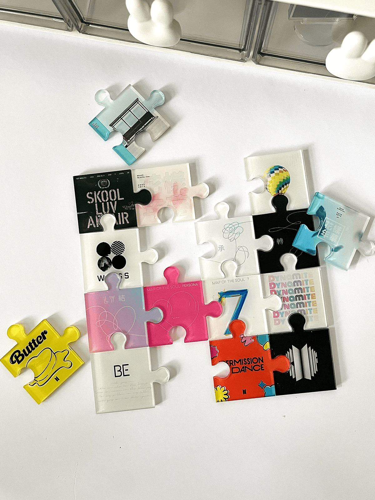 PUZZLE D'ALBUMS BTS QUI SE TRANSFORME EN CADRE DÉCORATIF