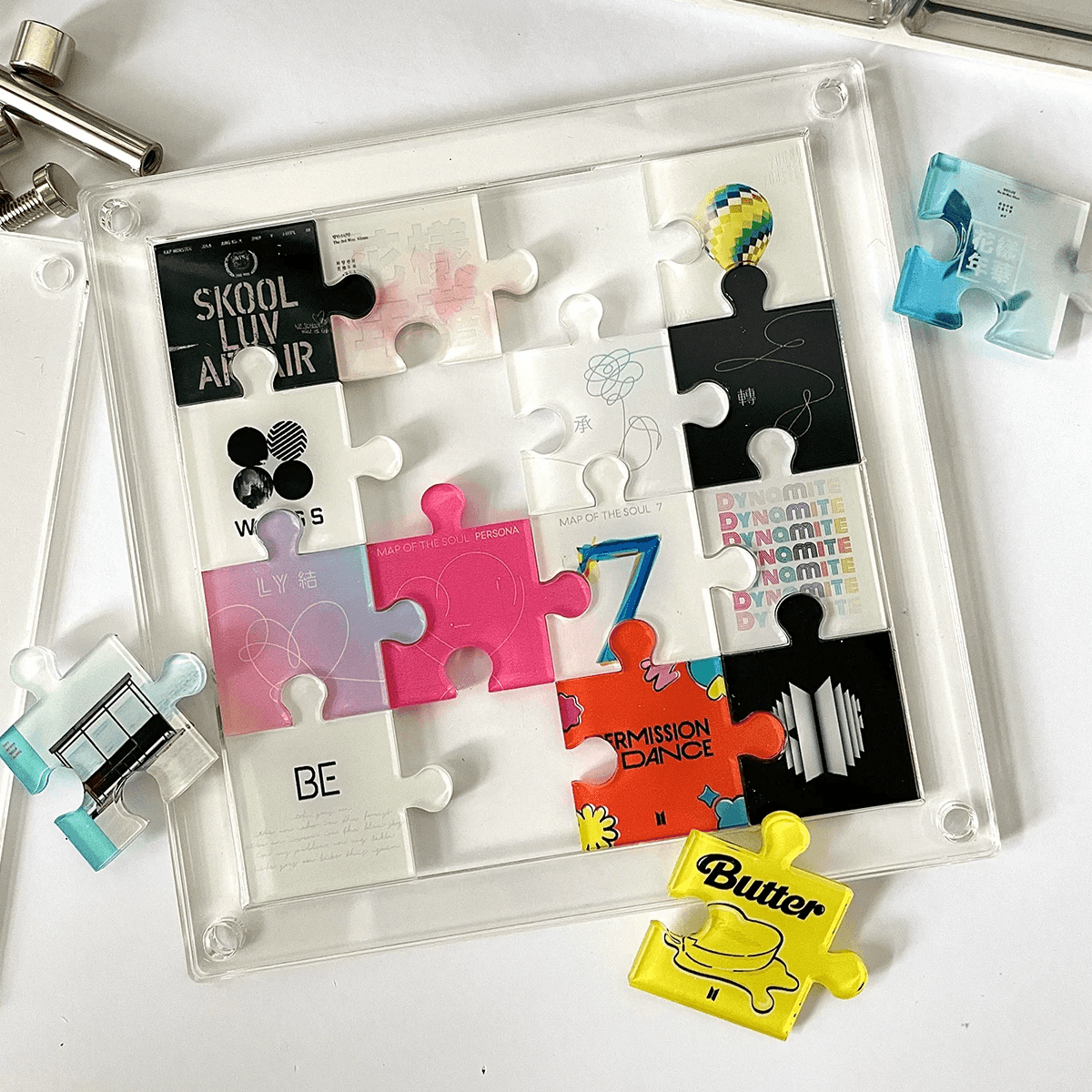 PUZZLE D'ALBUMS BTS QUI SE TRANSFORME EN CADRE DÉCORATIF